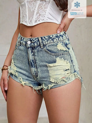 High-waisted distressed denim shorts in Vintage Washed Blue with frayed hem and ripped details.