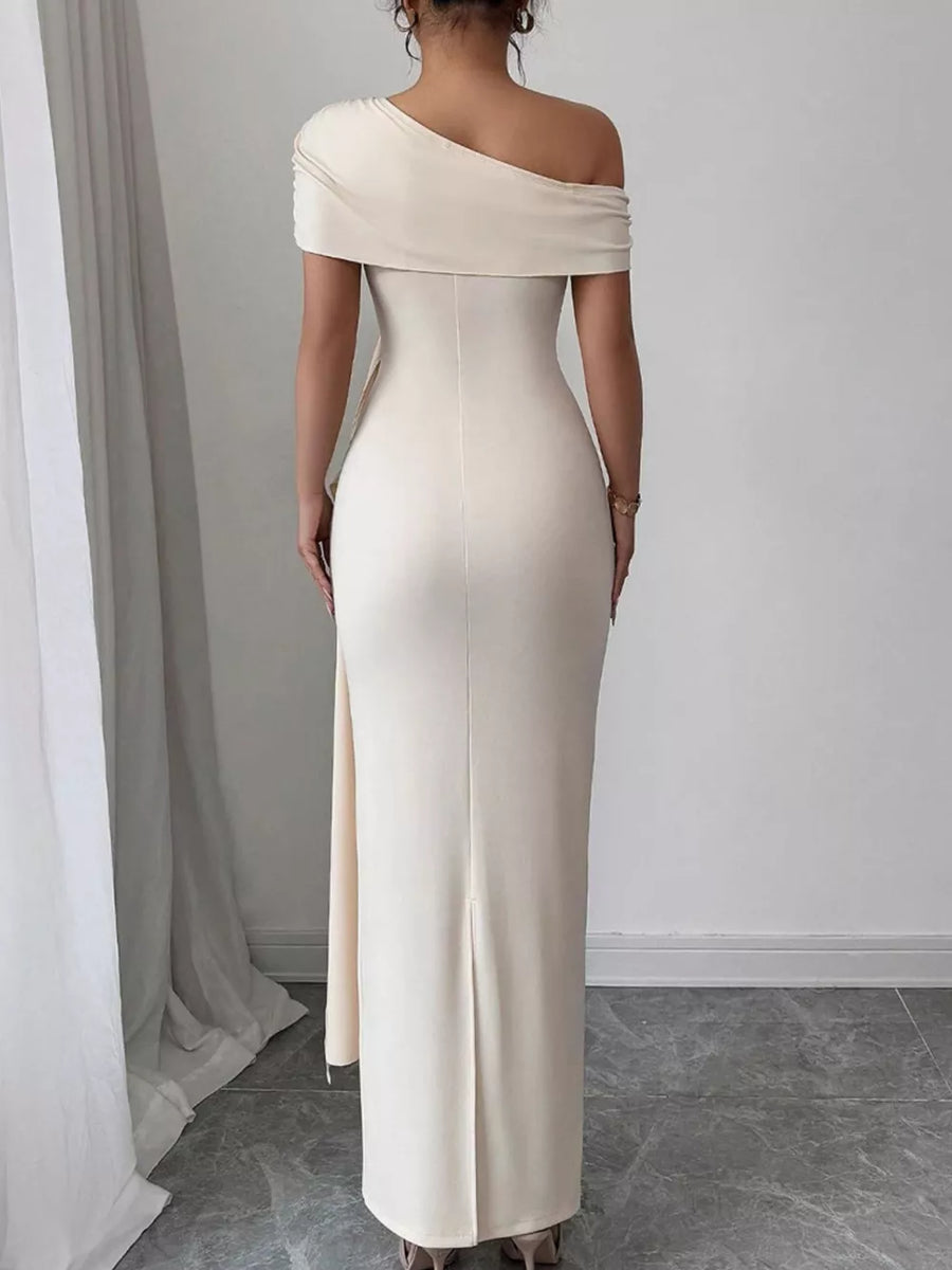Apricot asymmetrical ruched maxi dress with off-the-shoulder neckline and side slit.