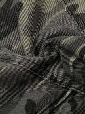 Camouflage cargo capris in cotton with utility pockets and button fly detail.