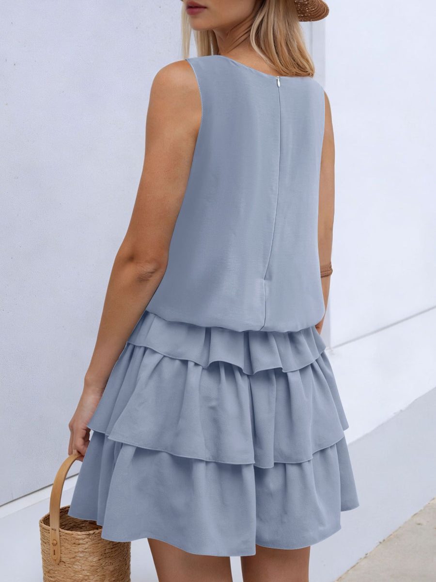 Light blue ruffled tiered mini dress with a zipper back detail.