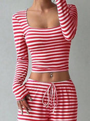 Red and white striped crop top and drawstring wide-leg pants loungewear set.