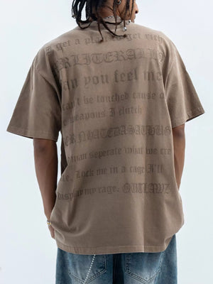 Brown oversized graphic tee with embossed text on back, 100% cotton.