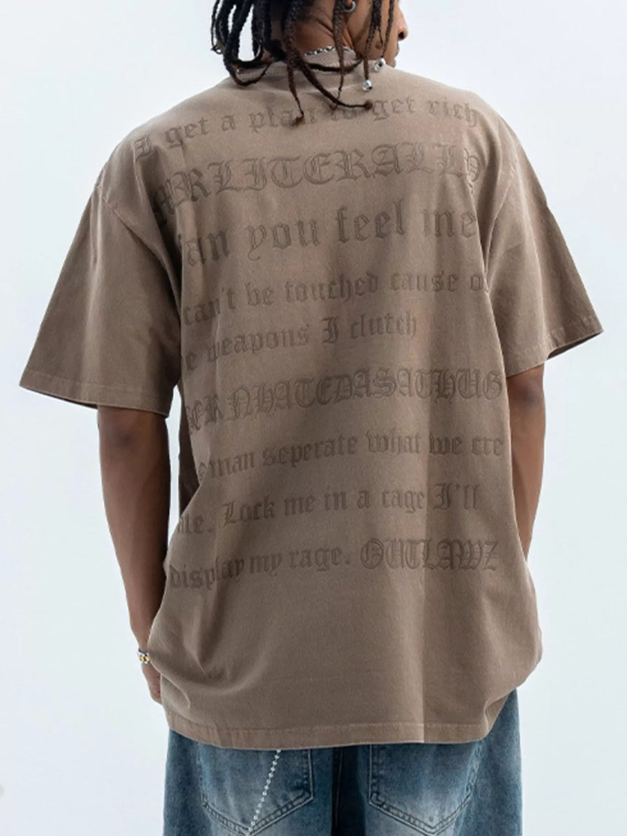 Brown oversized graphic tee with embossed text on back, 100% cotton.