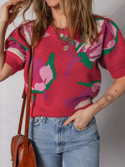 Women's scarlet abstract floral puff sleeve sweater with crew neck and short sleeves.