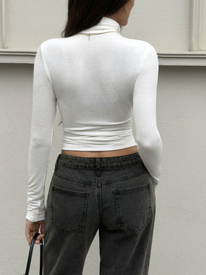 white t-shirt with ruched sleeves and long sleeve