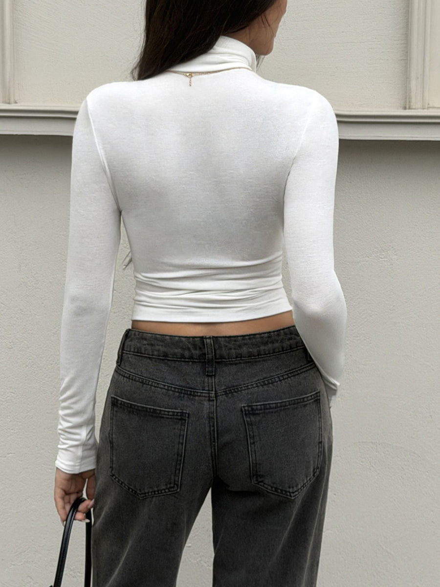 white t-shirt with ruched sleeves and long sleeve
