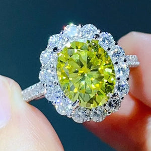 925 sterling silver,Moissanite Carat weight: 5ct Care instructions: Avoid wearin ring in Light Yellow with round silhouette