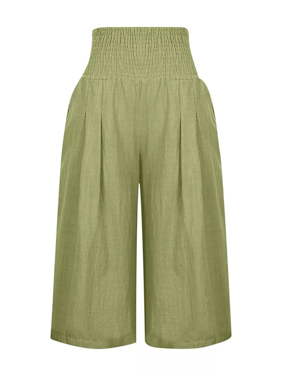 Wide leg culottes in olive green linen blend with smocked high waist and pleats