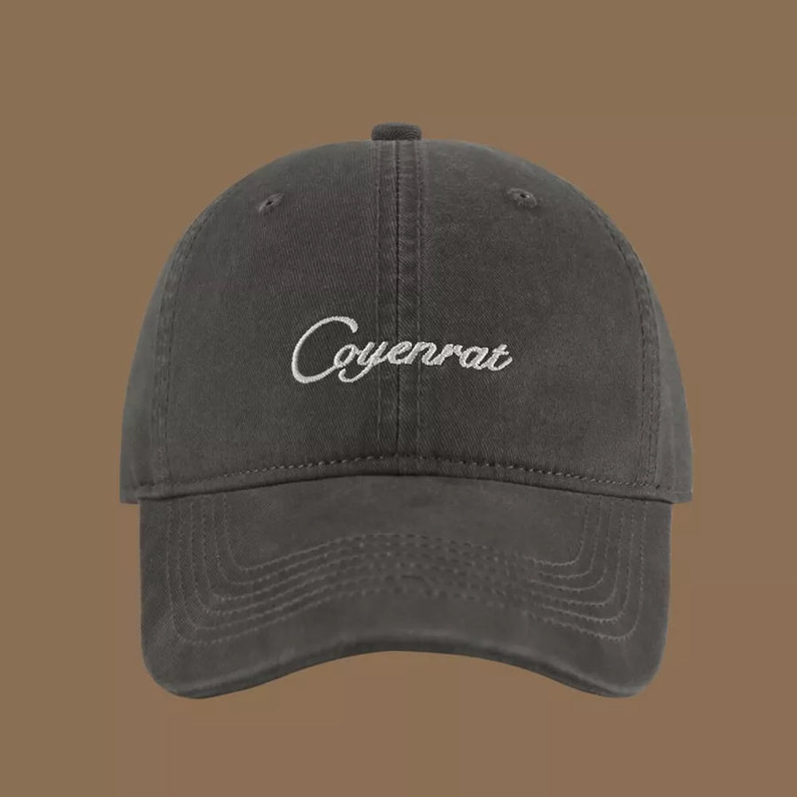 Charcoal baseball cap with white embroidered text