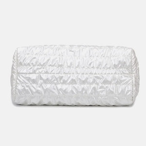 Glossy white padded weekend holdall with ruched detailing.