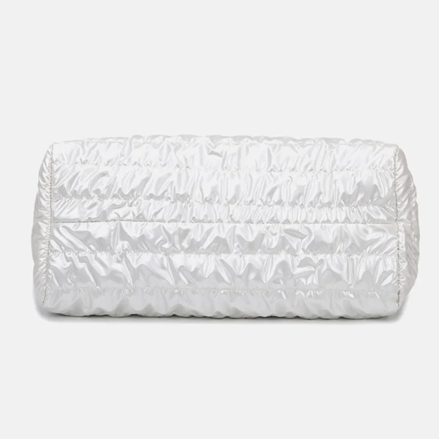 Glossy white padded weekend holdall with ruched detailing.