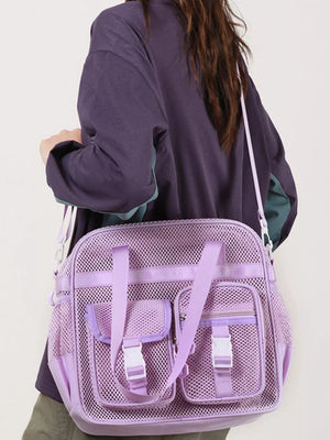 Lavender mesh crossbody bag with unique buckle accents and multiple pockets.