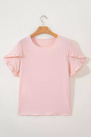 Blush pink polyester short sleeve blouse with ruffle trim on sleeves