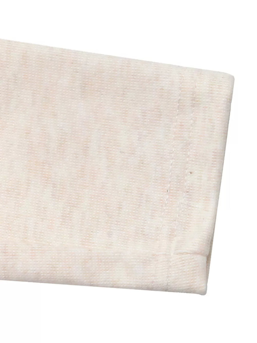 Cream marled knit long sleeve shirt cuff detail