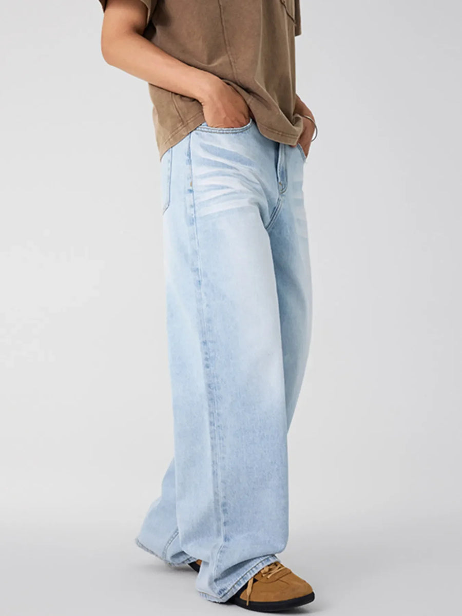 Washed wide-leg men's jeans in glacier blue denim with a relaxed fit.