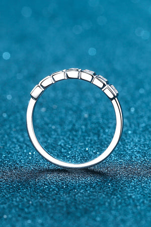 Silver band ring with prism cut diamonds
