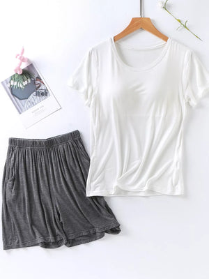 White short sleeve pajama top and heather gray shorts with pockets and elastic waistband