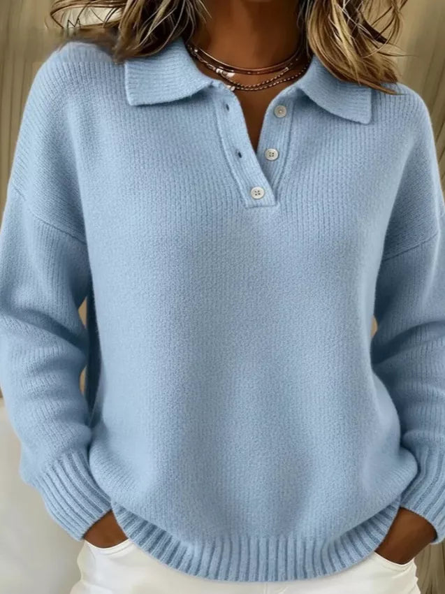 pullover sweater in sky blue featuring ribbed cuffs and relaxed fit