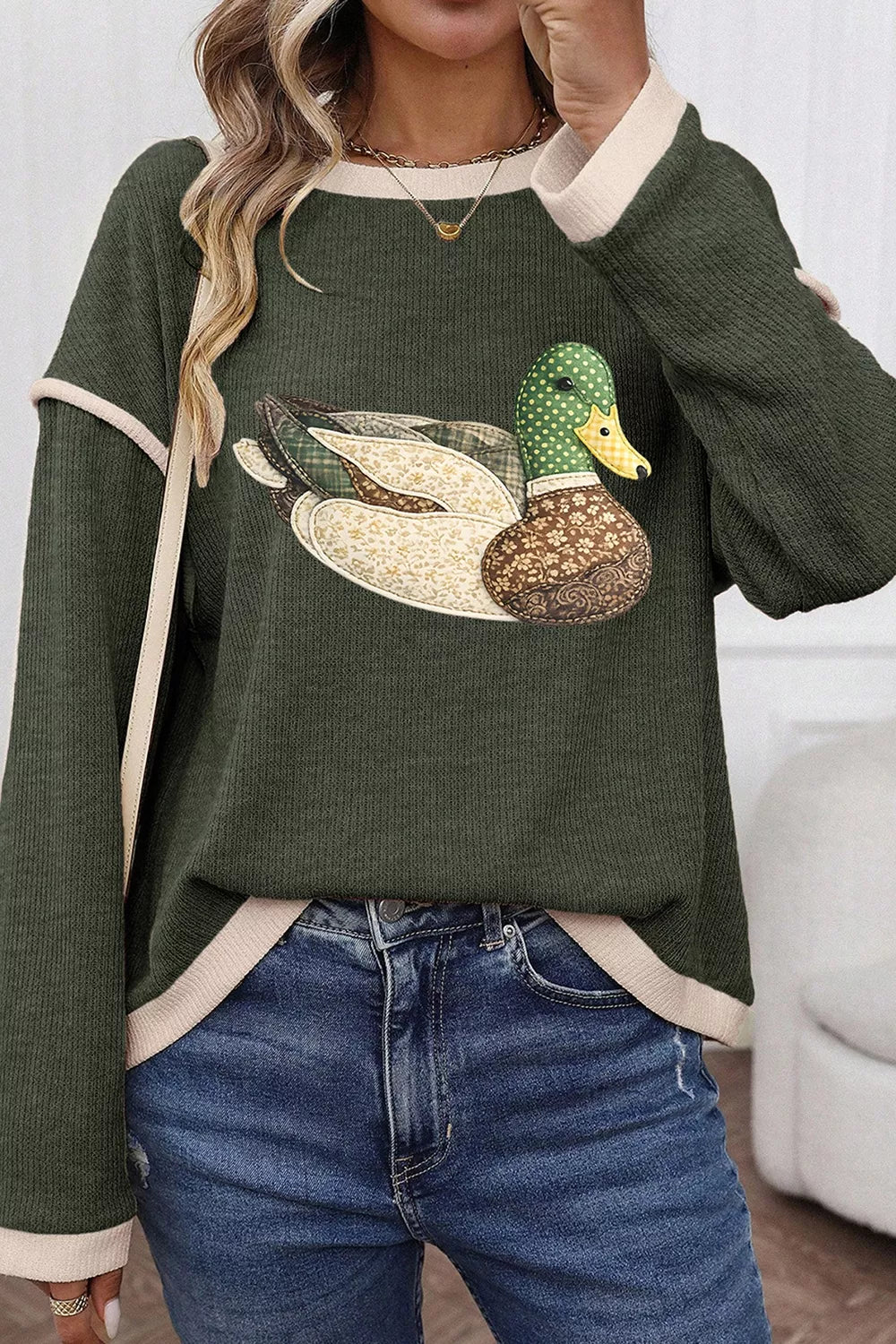 pullover sweater in Army Green with graphic print and contrast trim