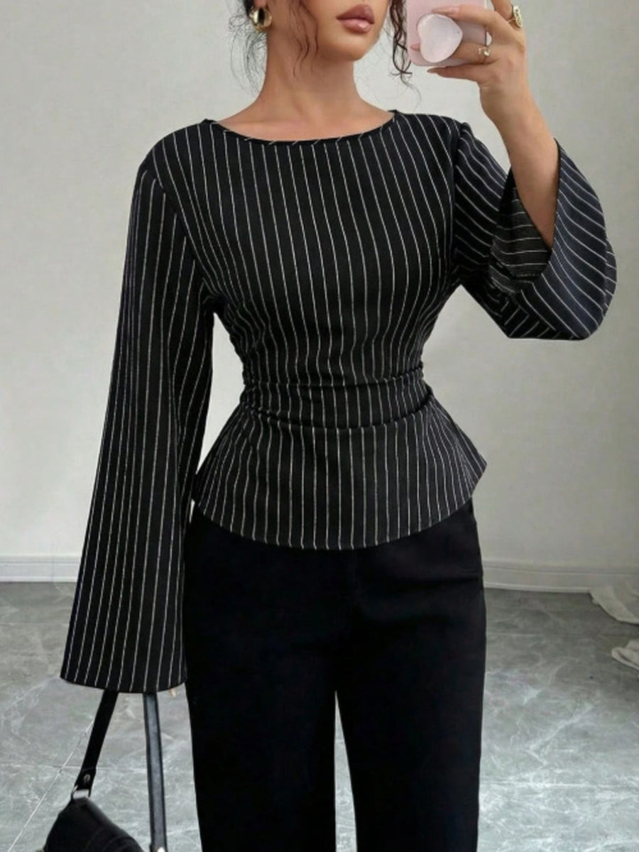 white blouse featuring peplum and striped