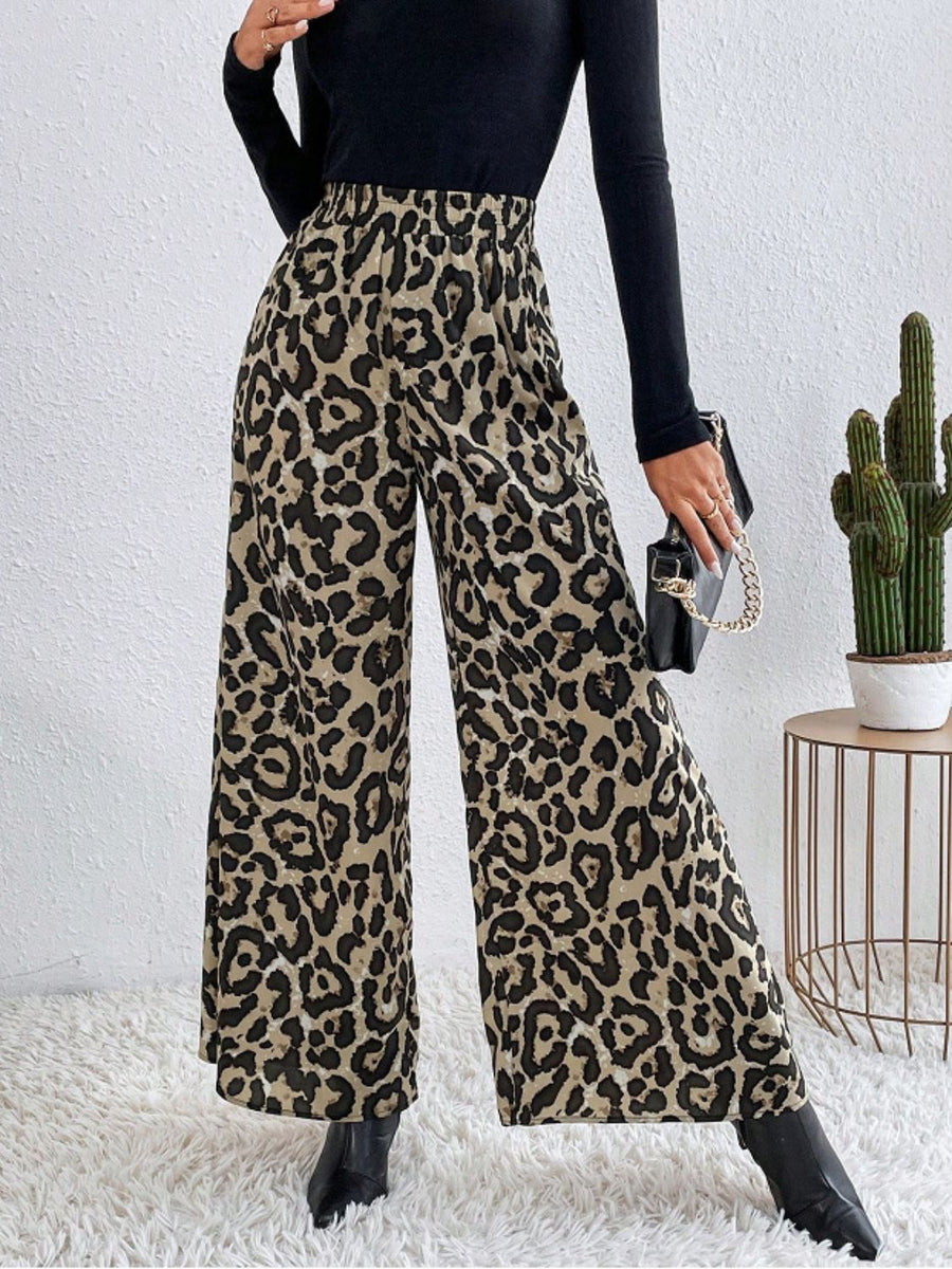 Leopard print palazzo trousers with a high elastic waist, wide leg and full length.