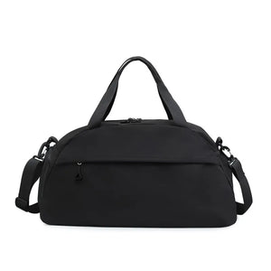 Black duffle bag with detachable strap and front zip pocket