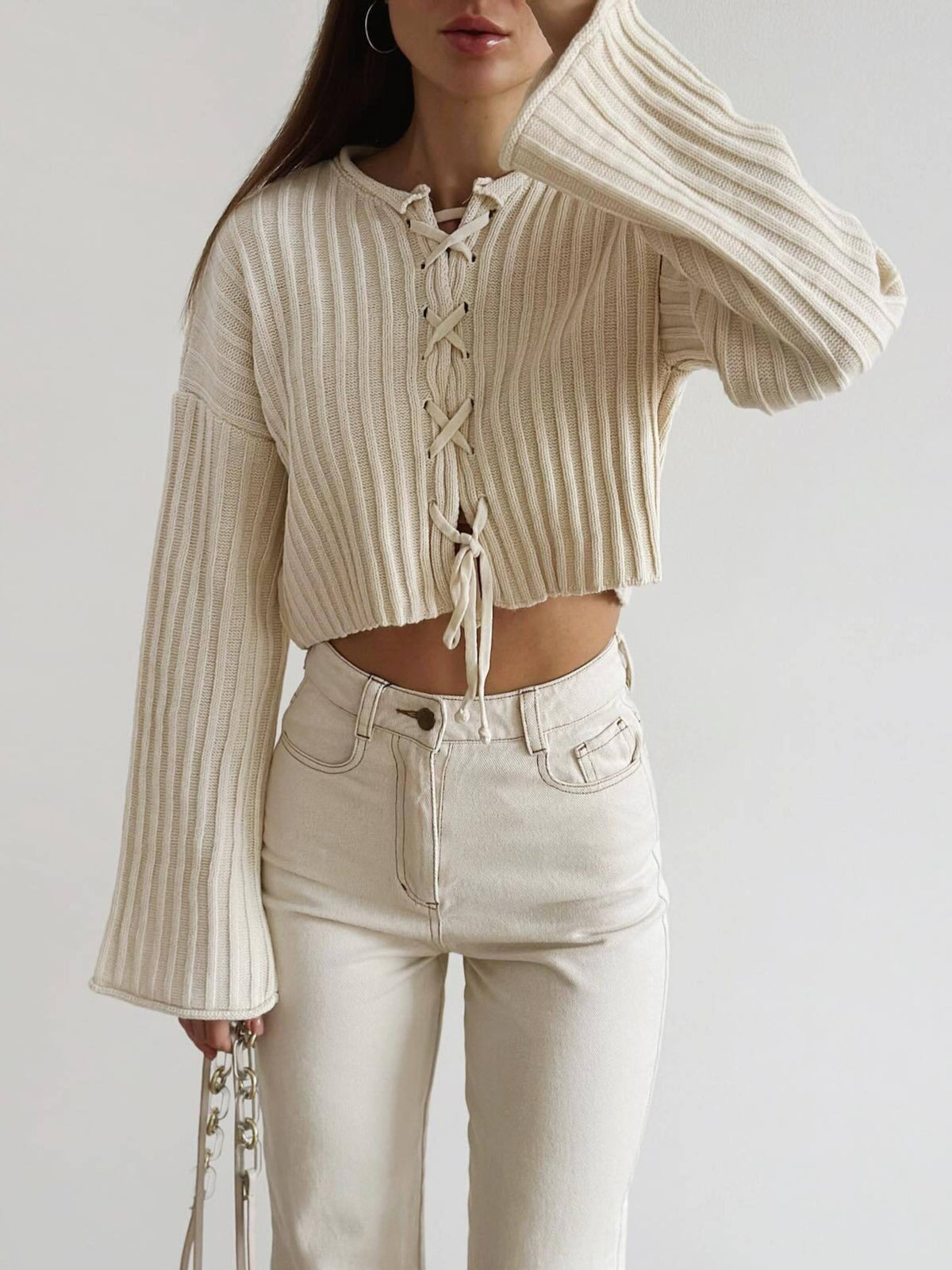 cream pullover sweater with ribbed and round neck