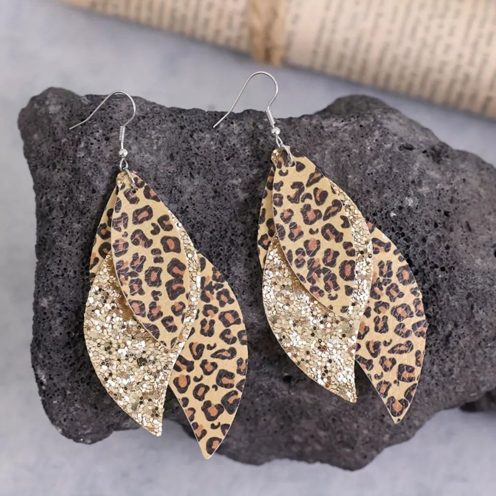 dark brown earrings featuring layered and leopard-print