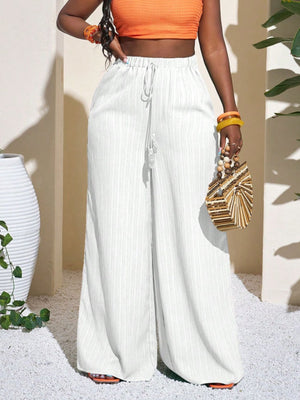 100% polyester Care instructions: Machine wash cold wide-leg pants in White with wide-leg silhouette