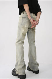 Vintage wash flare denim trousers in light blue with a relaxed fit.
