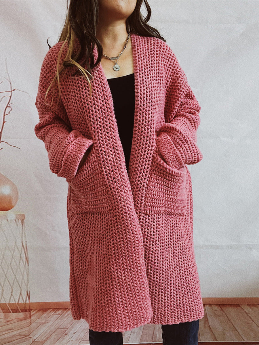 Chunky knit cocoon cardigan coat in dusty pink with oversized sleeves and pockets.