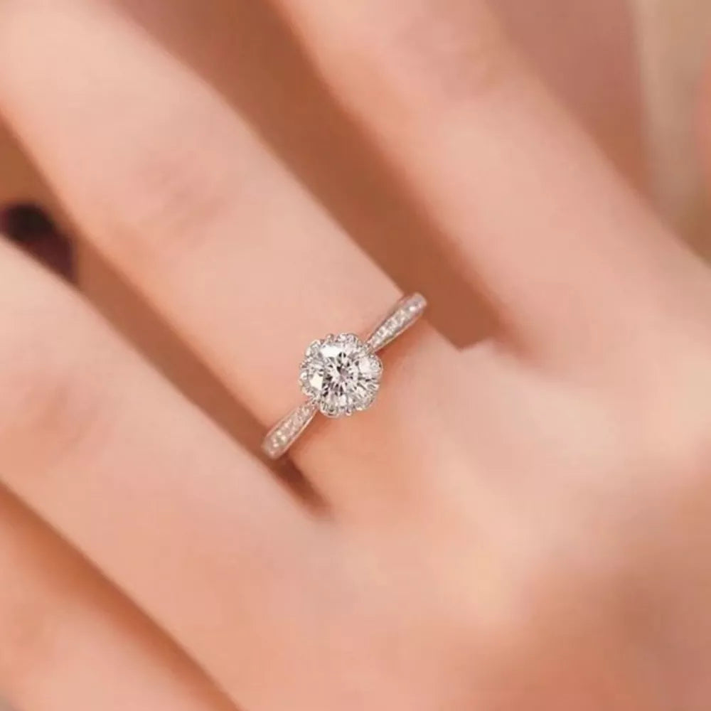 925 sterling silver,Moissanite Carat weight: 1ct Care instructions: Avoid wearin ring in clear with straight silhouette