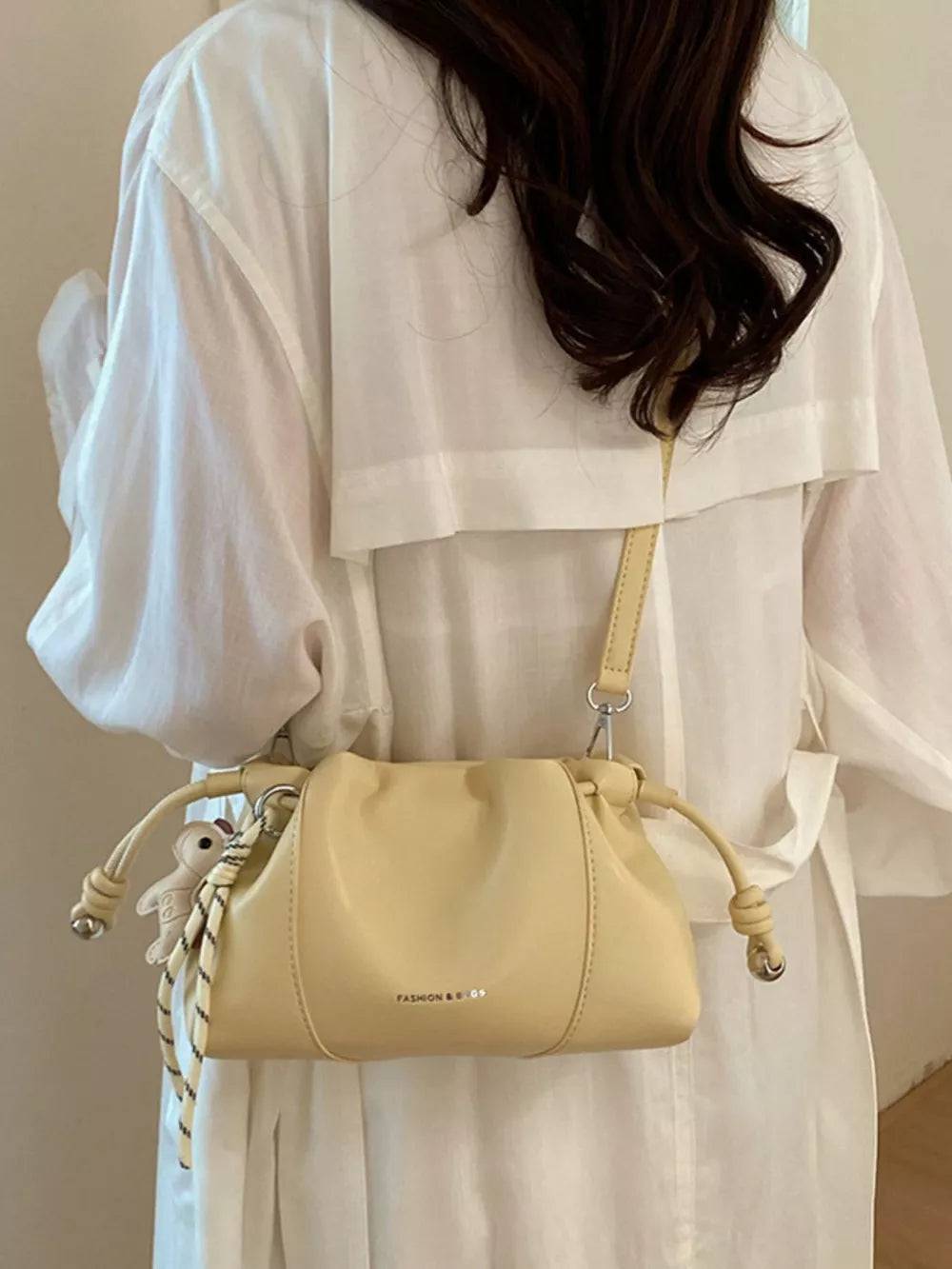 Black with crossbody bag with drawstring closure 14