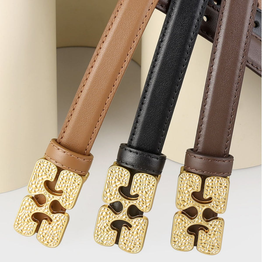 Textured buckle cowhide leather belts in brown, coffee brown, and black with gold hardware.