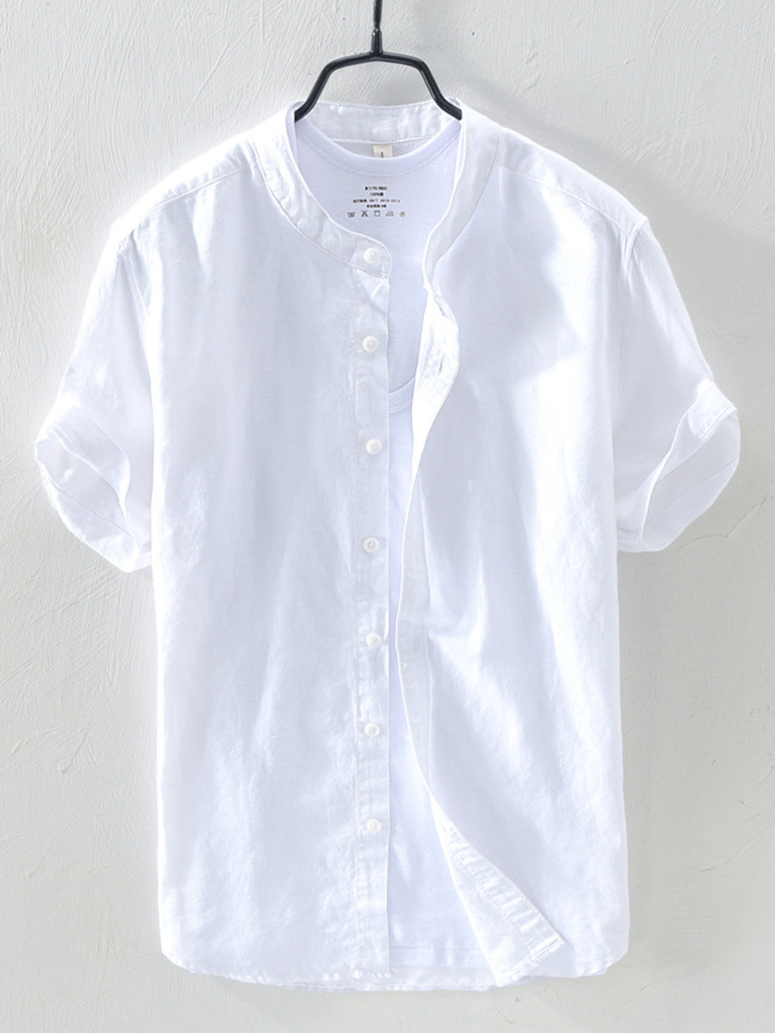 White linen short sleeve band collar shirt with button front