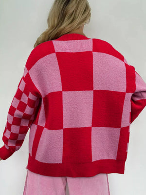 Checkerboard knit cardigan in deep rose and red with a relaxed fit.