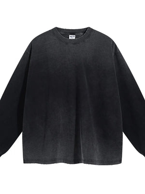 Vintage wash oversized crewneck sweatshirt in black with distressed hem and neckline.