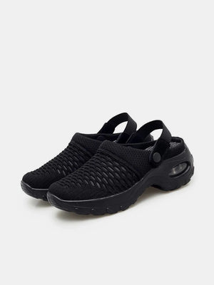 Black air cushion mesh slingbacks with adjustable strap and clear heel detail.