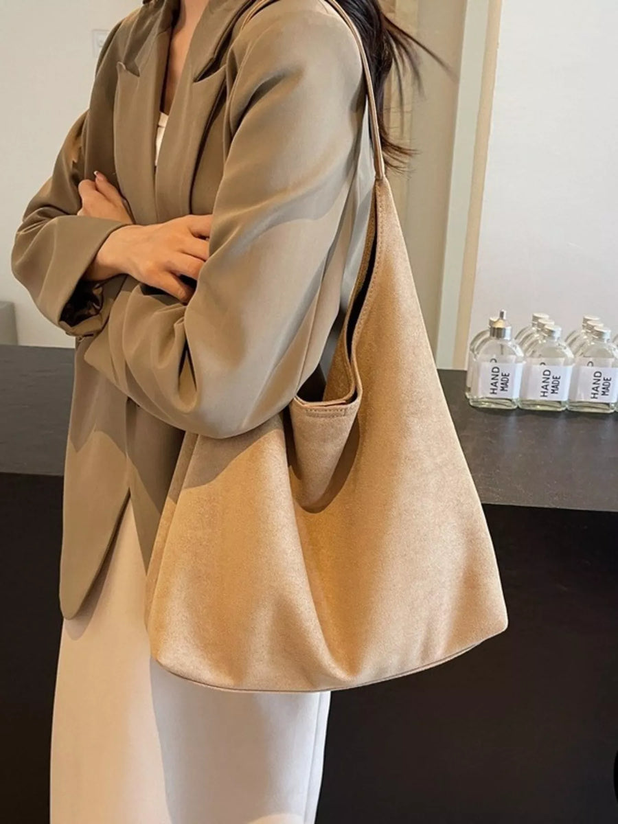 Elegant suede hobo tote mini in khaki with a slouchy silhouette and single strap.