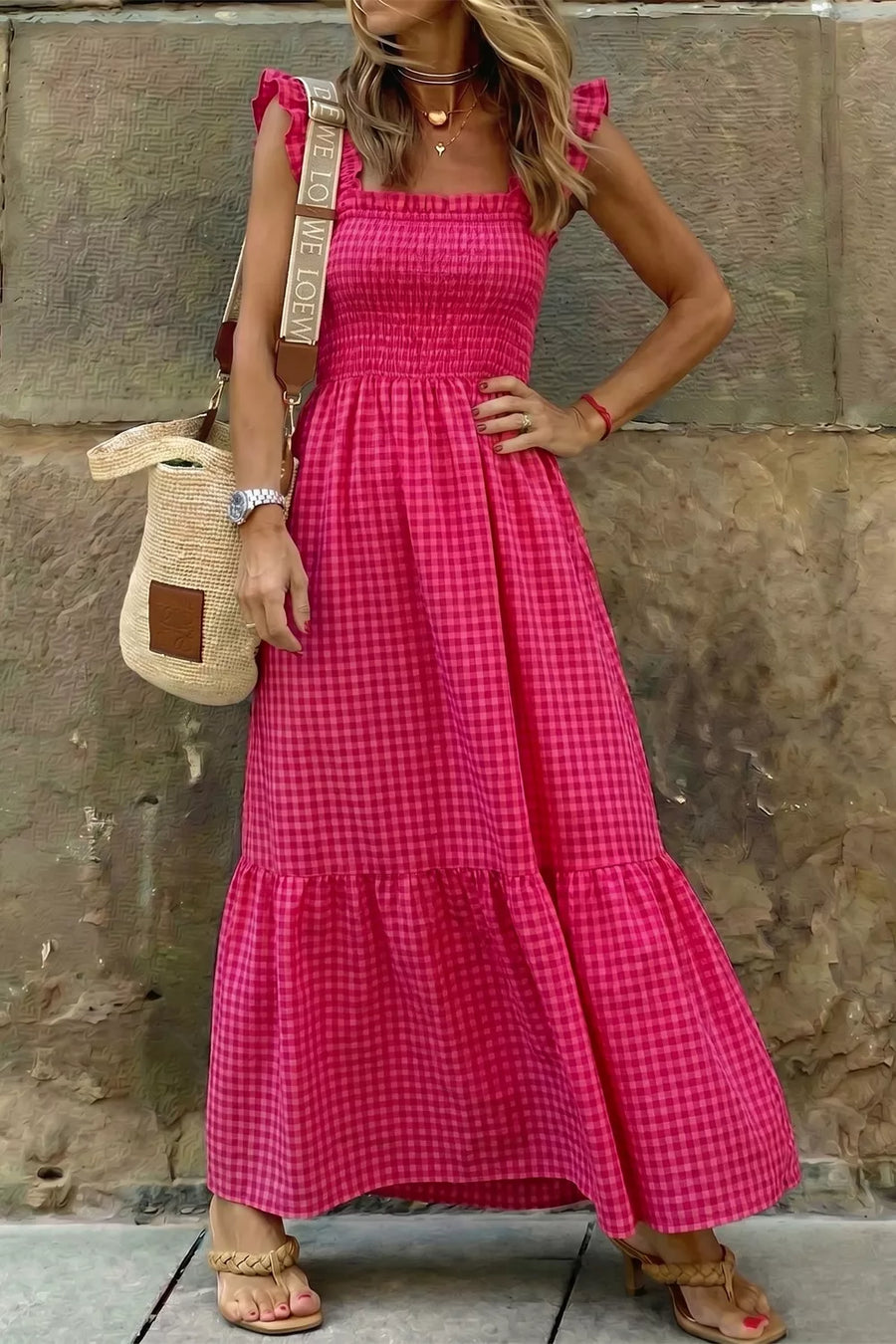 Charming plaid fit-and-flare sundress in deep rose cotton with smocked bodice and ruffled sleeves.