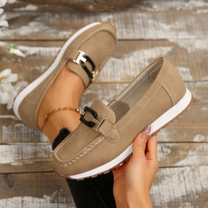 Buckle casual slip-on loafers in khaki with contrast stitching and gold hardware.