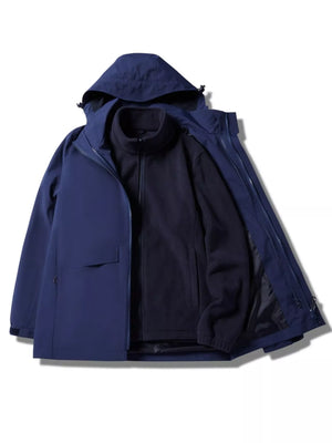 Men's dark blue hooded waterproof jacket with zip-out fleece liner.