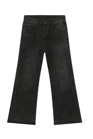 Black denim jeans with panel seams and a flare leg cut.