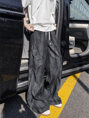 wide-leg pants in charcoal featuring drawstring waist and wide-leg fit