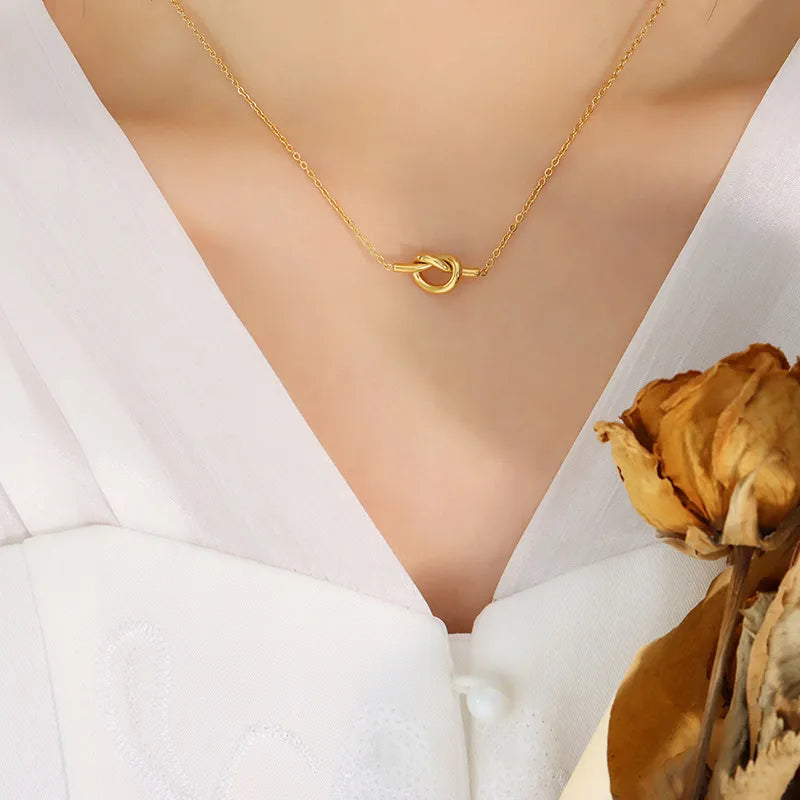Gold knot pendant necklace with delicate chain, 18K gold-plated for women