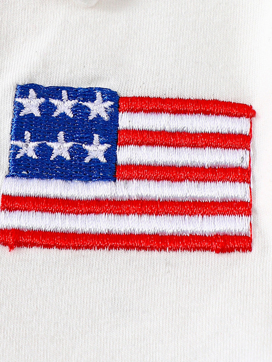 White cotton baby outfit with embroidered American flag detail