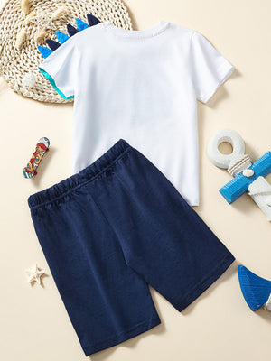 Toddler dinosaur graphic t-shirt and navy shorts set with blue spikes on collar.