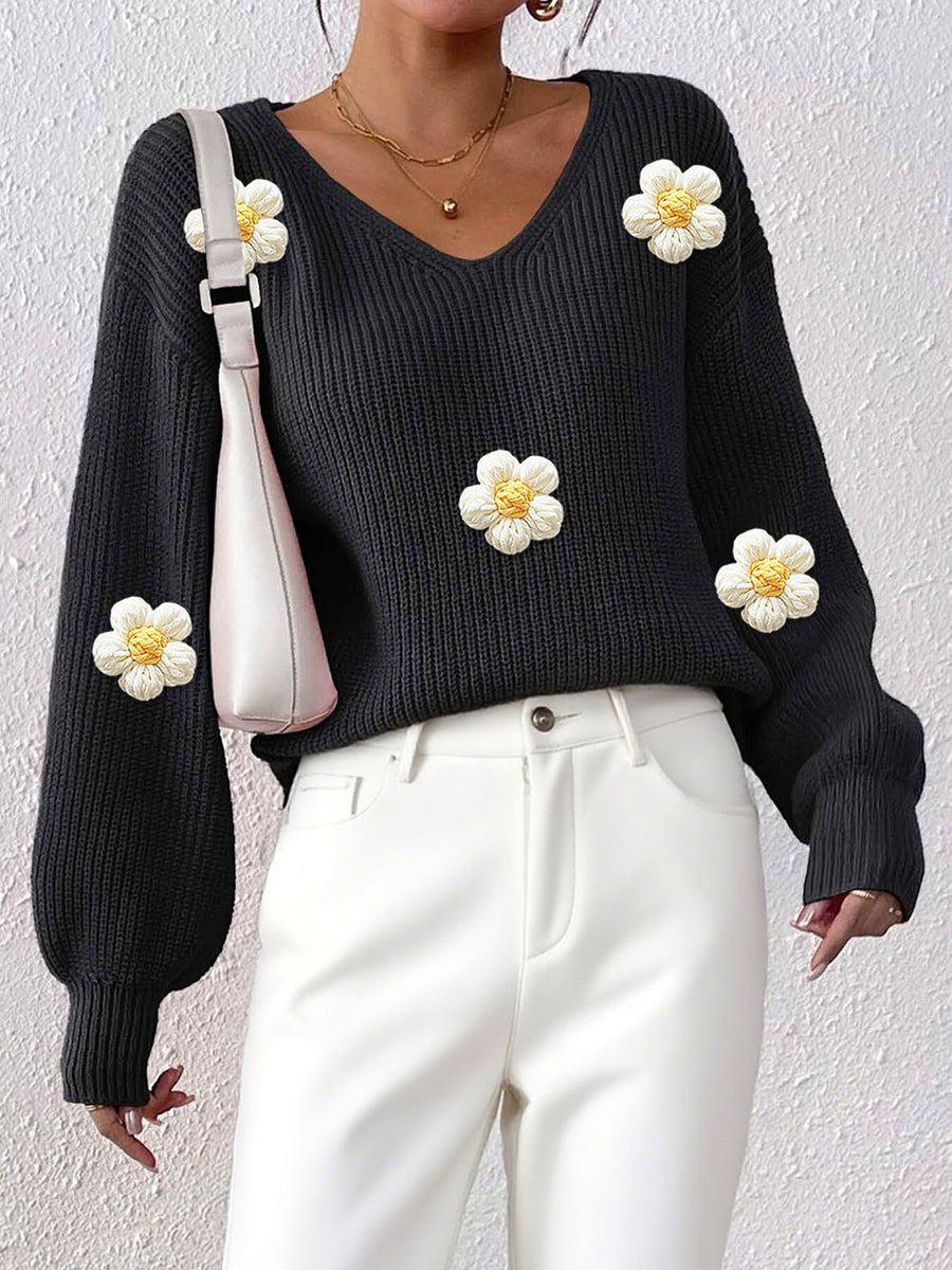 v-neck sweater featuring floral in Black with 100% polyester Care instructions: Machine wash cold texture