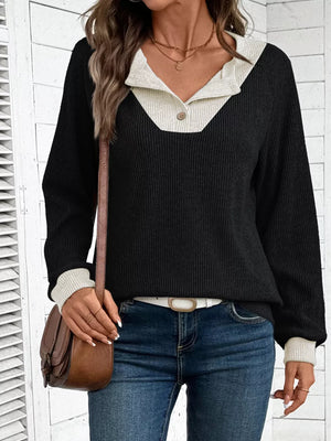 Chic ribbed two-tone maternity shirt in black and beige with button detail.
