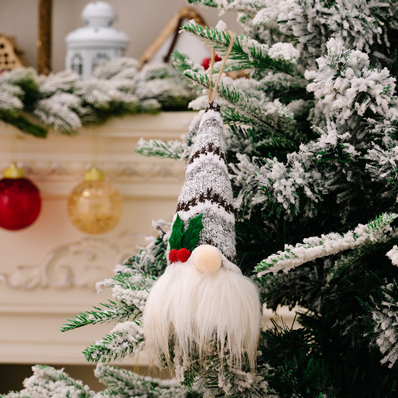 Gray and white striped gnome ornament with white beard and red berries
